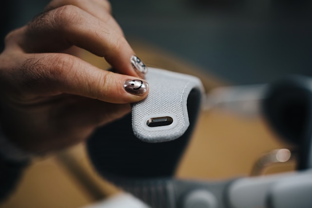 Hands adjusting a sensor strap